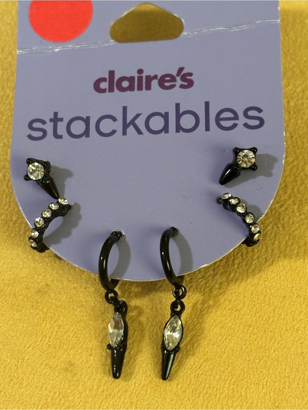 Earring and earring backs on card